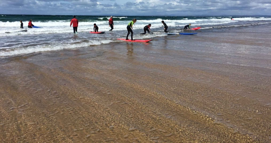 kids learning to surf - ireland surf lessons